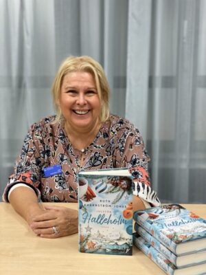 Ruth with her book "Julstök i Halleholm" at the Gothenburg Book Fair in 2021.